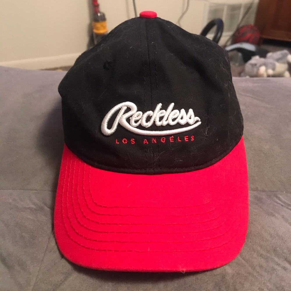 Young and reckless strap back hat